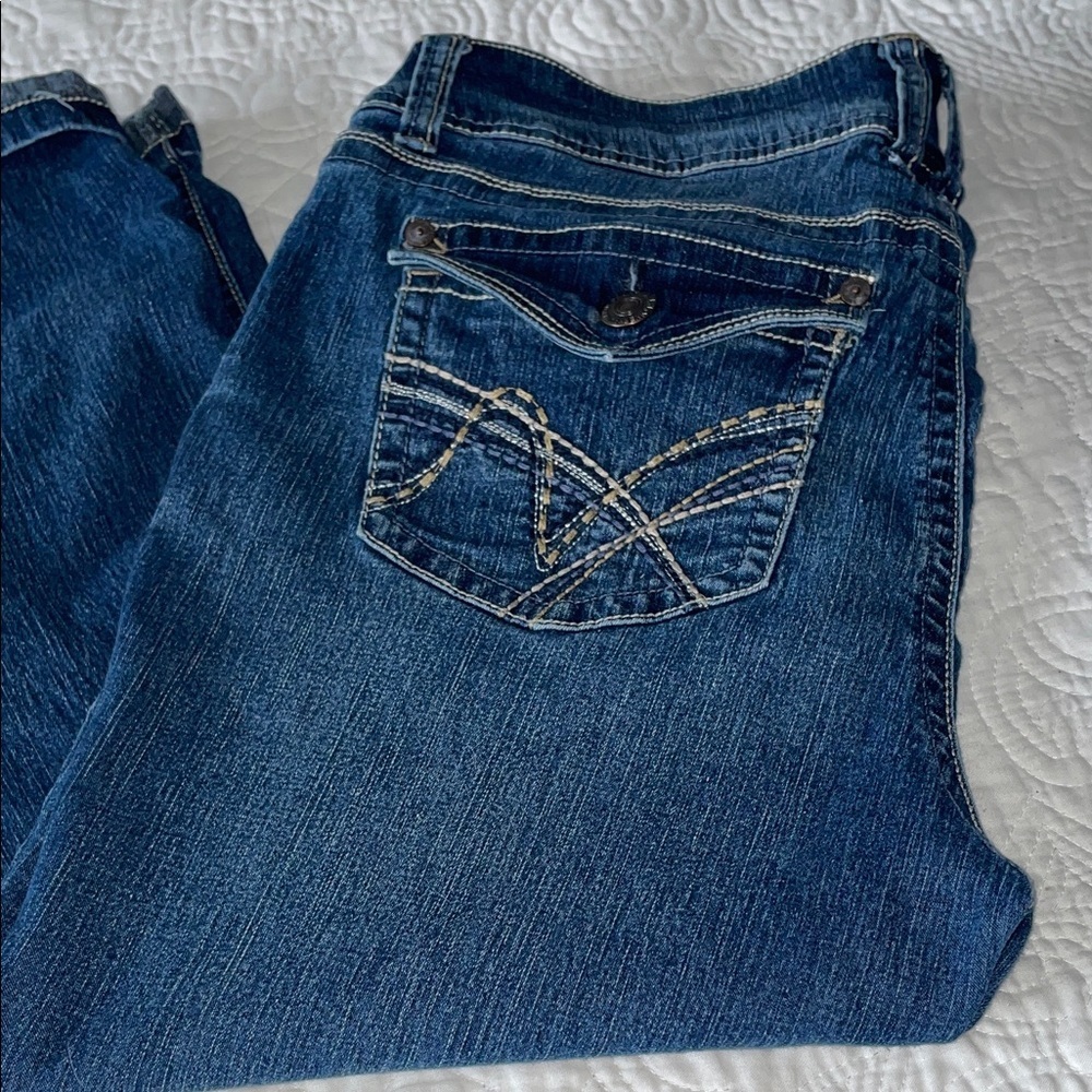 Wallflower Dark Blue Capris/rolled calf hem. Decorate back pockets. Size 11